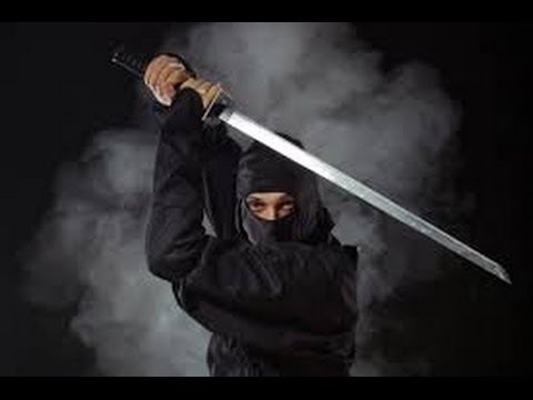 A image of a ninja using a smoke bomb to dodge.